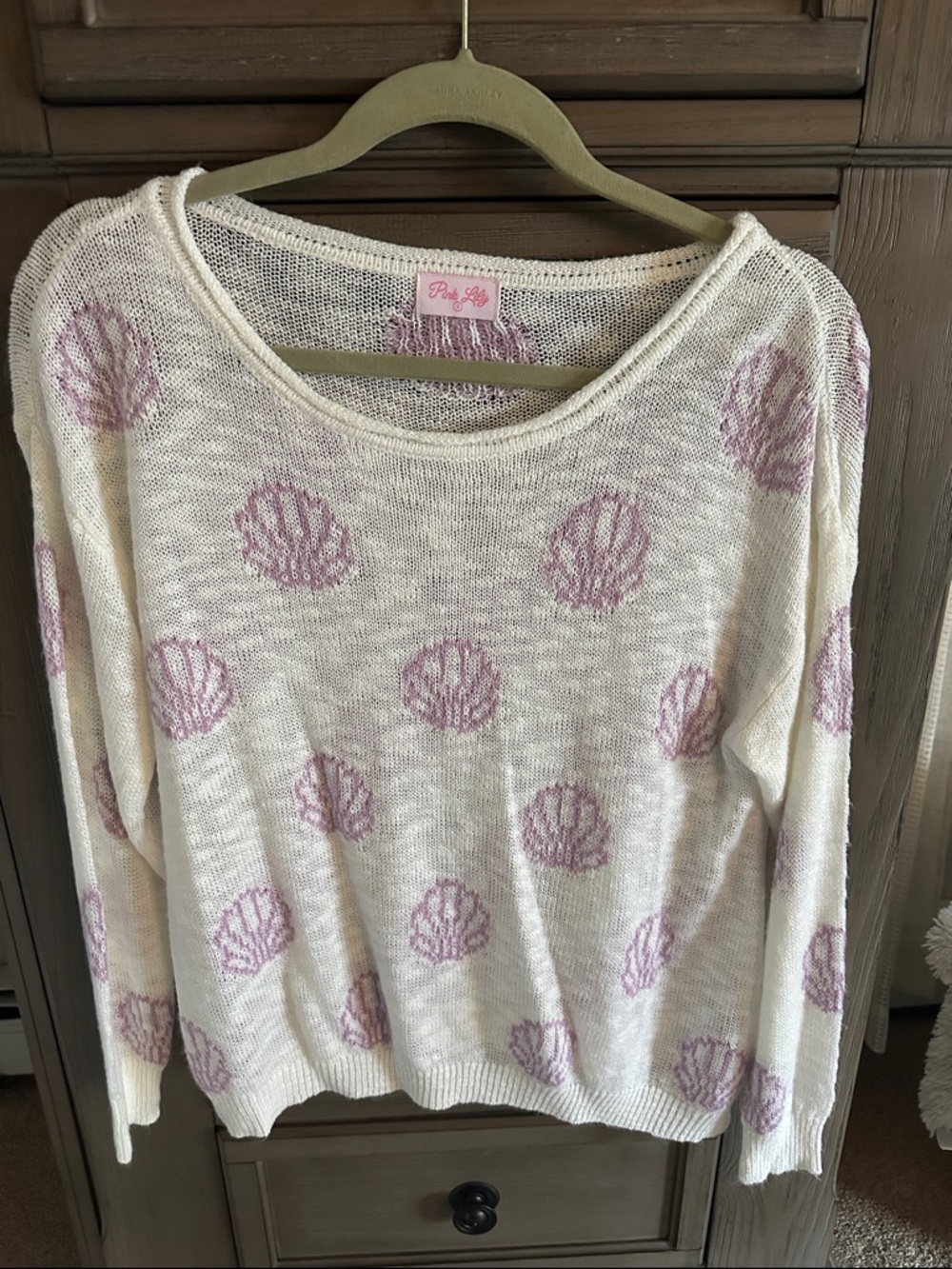 Pink Lily Cream Knit Sweater with Pink Shell Motif